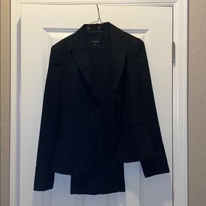 The limited black suit